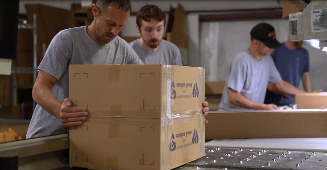 Men packaging propane products
